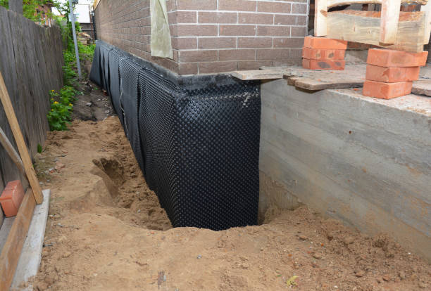 SJ Waterproofing Pros technician performing targeted Sump Pump Installation assessment in New Castle, KY